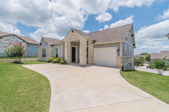116 Mulligan Dr Unit 103, San Marcos, TX 78666 - view of front of home with stone siding, an attached garage, board and batten siding, and driveway