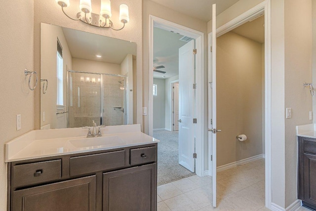 116 Mulligan Dr Unit 103, San Marcos, TX 78666 - full bathroom with vanity, a shower stall, a chandelier, tile patterned floors, and ceiling fan