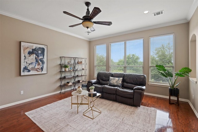 25 Falling Oaks Trl, The Hills, TX 78738 - living room with a ceiling fan, wood finished floors, crown molding, arched walkways, and recessed lighting