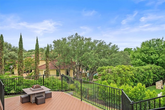 25 Falling Oaks Trl, The Hills, TX 78738 - deck featuring an outdoor fire pit