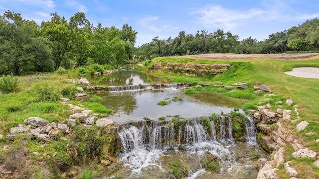25 Falling Oaks Trl, The Hills, TX 78738 - surrounding community featuring a water view