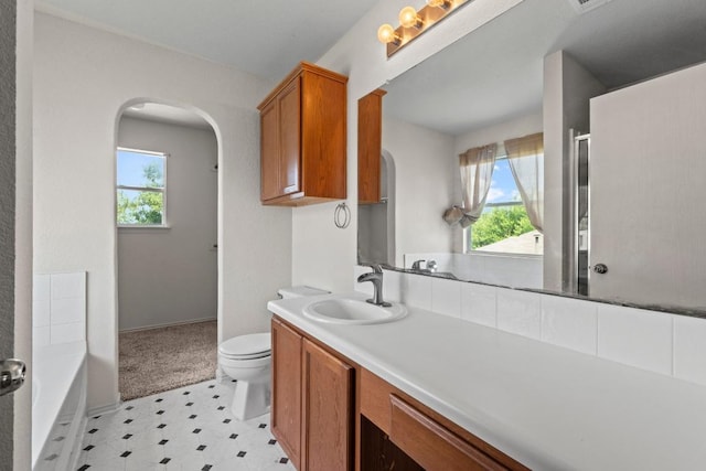 4608 Acers Ln, Austin, TX 78725 - bathroom featuring healthy amount of natural light, tile patterned floors, vanity, and a shower