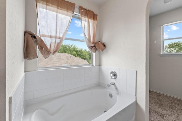 4608 Acers Ln, Austin, TX 78725 - bathroom with a garden tub