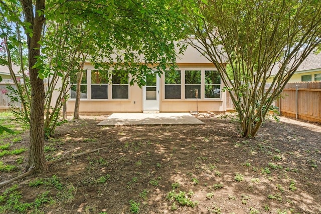 4608 Acers Ln, Austin, TX 78725 - rear view of house with a patio area