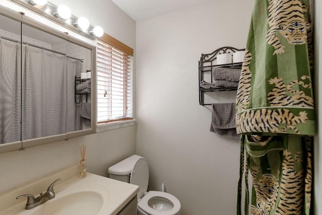 6612 Ashland Dr, Austin, TX 78723 - bathroom featuring vanity and curtained shower