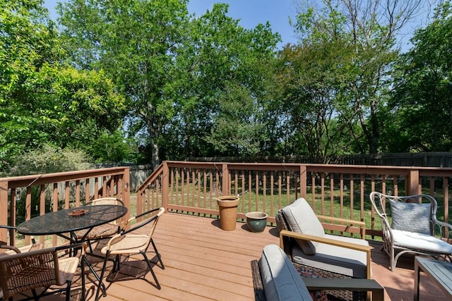 6612 Ashland Dr, Austin, TX 78723 - deck featuring a fenced backyard and outdoor dining area