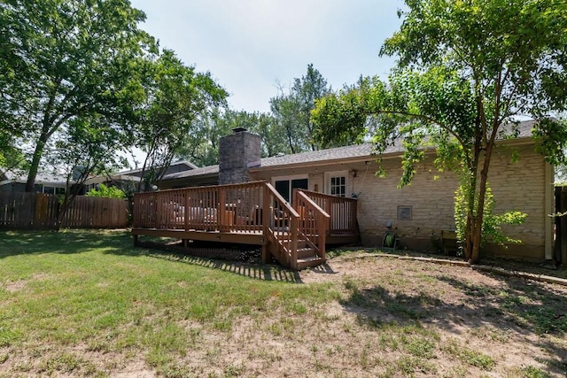 6612 Ashland Dr, Austin, TX 78723 - back of property featuring a deck and a chimney