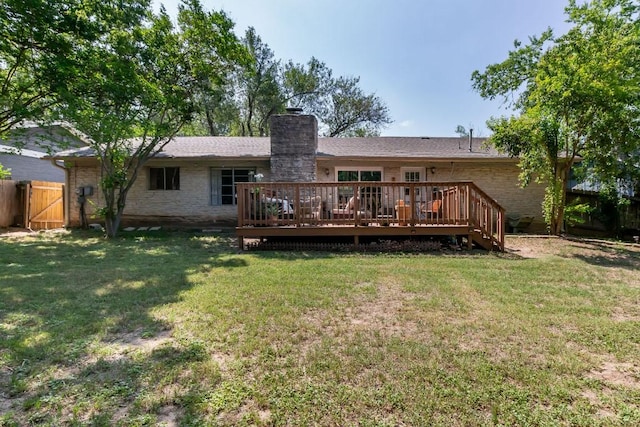 6612 Ashland Dr, Austin, TX 78723 - rear view of house with a wooden deck and a chimney