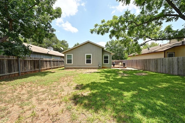 9710 Curlew Dr, Austin, TX 78748 - rear view of house with a fenced backyard