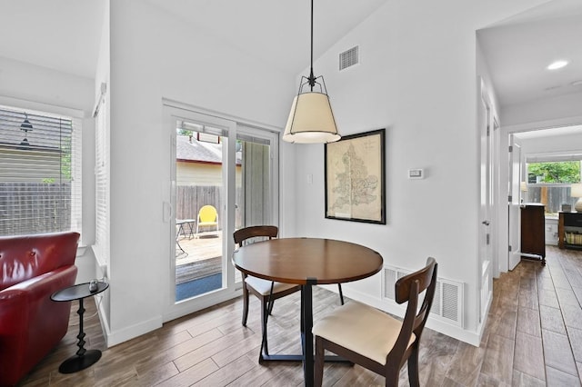 9710 Curlew Dr, Austin, TX 78748 - dining room with wood finished floors and high vaulted ceiling