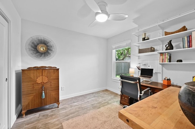 9710 Curlew Dr, Austin, TX 78748 - office area with a ceiling fan and wood finished floors