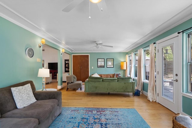 4604 Rue St, Austin, TX 78731 - living area with a ceiling fan, wood finished floors, and crown molding