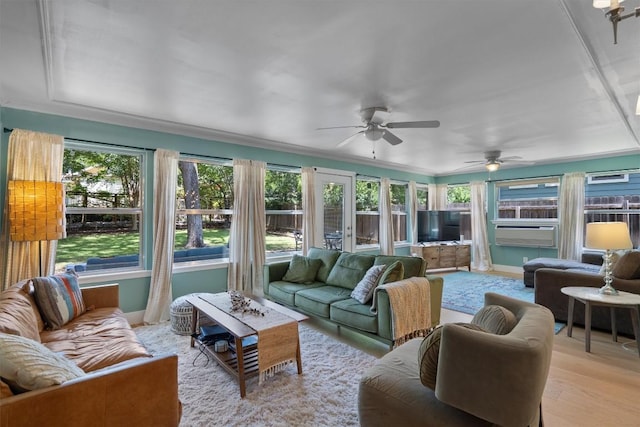 4604 Rue St, Austin, TX 78731 - living room with plenty of natural light, ceiling fan, and light wood-type flooring