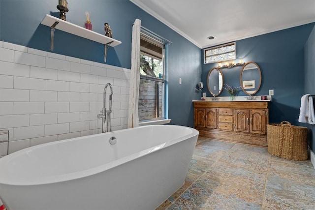 4604 Rue St, Austin, TX 78731 - full bathroom with stone tile floors, double vanity, a freestanding bath, and crown molding