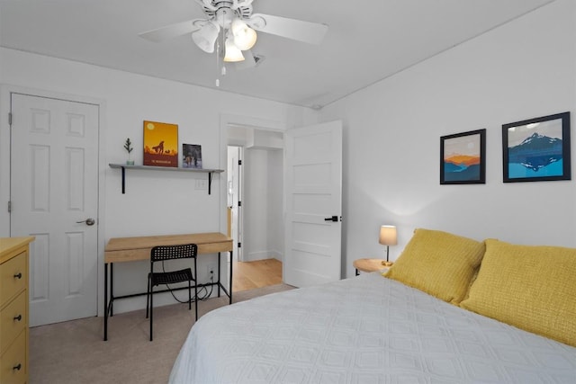 4604 Rue St, Austin, TX 78731 - bedroom with light colored carpet and ceiling fan