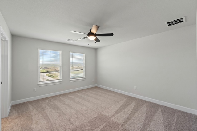 9517 Balmy Ln, Manor, TX 78653 - unfurnished room with ceiling fan and light carpet