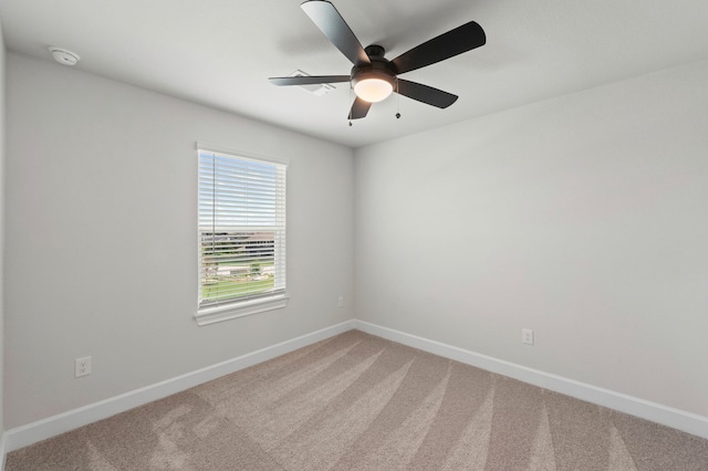 9517 Balmy Ln, Manor, TX 78653 - empty room featuring a smoke detector, light colored carpet, and a ceiling fan