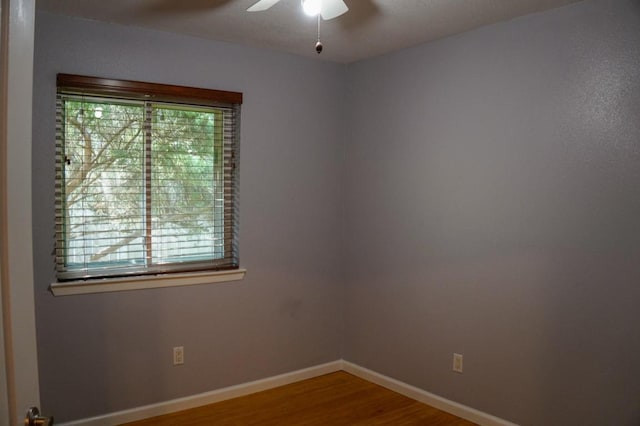 22631 John Rolfe Ln, Katy, TX 77449 - unfurnished room featuring ceiling fan, plenty of natural light, and wood finished floors