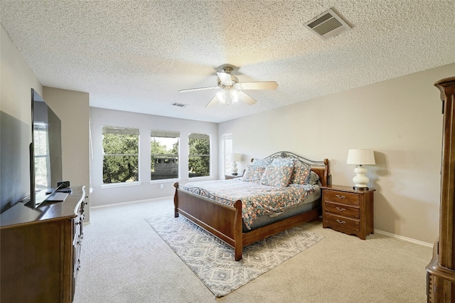 2011 Rachel Rdg, Cedar Park, TX 78613 - carpeted bedroom with a textured ceiling and ceiling fan