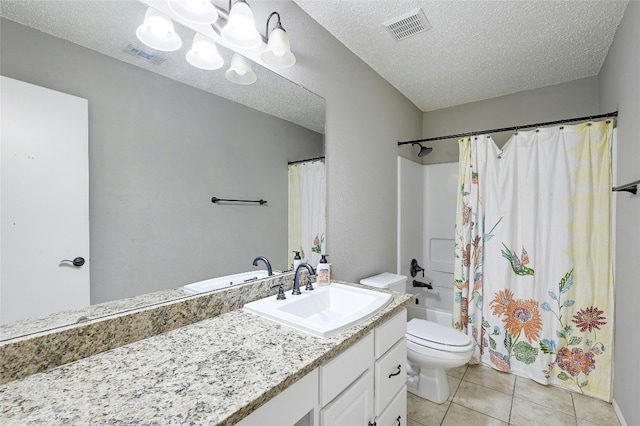 2011 Rachel Rdg, Cedar Park, TX 78613 - bathroom featuring vanity, tile patterned flooring, shower / bathtub combination with curtain, and a textured ceiling