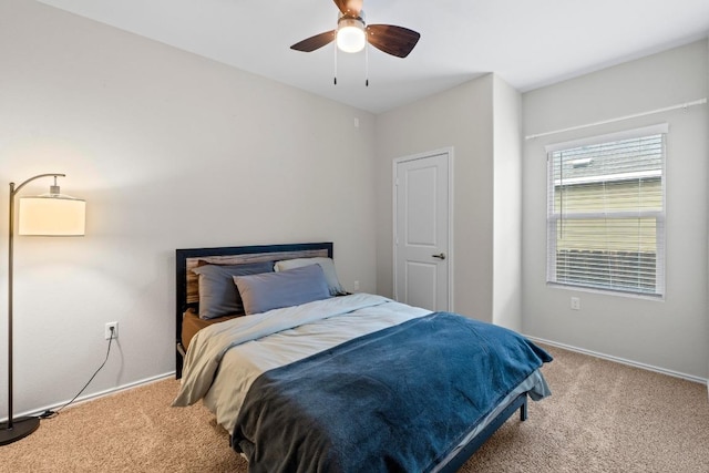2416 Nightview Dr, Pflugerville, TX 78660 - bedroom featuring carpet floors and a ceiling fan