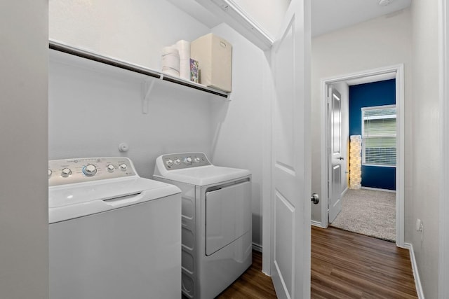 2416 Nightview Dr, Pflugerville, TX 78660 - laundry room with separate washer and dryer and dark wood-type flooring