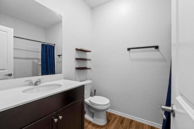 2416 Nightview Dr, Pflugerville, TX 78660 - bathroom with wood finished floors, vanity, and a shower with shower curtain