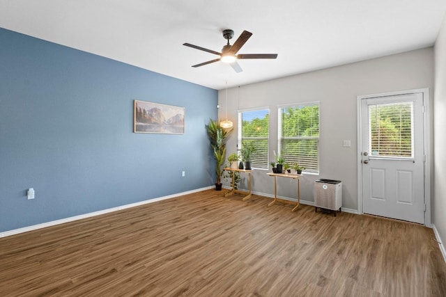 2416 Nightview Dr, Pflugerville, TX 78660 - spare room featuring wood finished floors and a ceiling fan