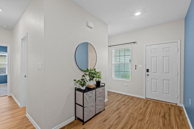 2416 Nightview Dr, Pflugerville, TX 78660 - entryway with light wood-style floors and recessed lighting