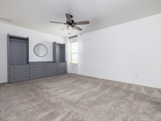 752 Circle Way Unit 35H, Jarrell, TX 76537 - unfurnished bedroom featuring carpet floors and a ceiling fan