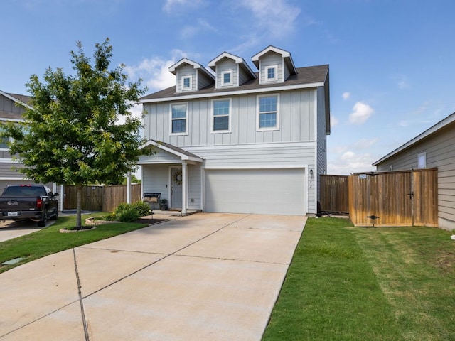 752 Circle Way Unit 35H, Jarrell, TX 76537 - view of front of home featuring board and batten siding, a garage, and concrete driveway