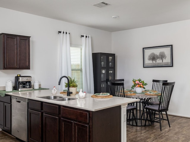 752 Circle Way Unit 35H, Jarrell, TX 76537 - kitchen with dishwasher, dark wood-style flooring, light countertops, and dark brown cabinetry