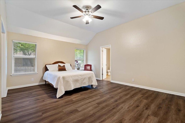 1601 Muledeer Run, Leander, TX 78641 - bedroom with dark wood-style floors, vaulted ceiling, a ceiling fan, and ensuite bath