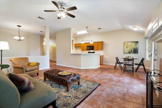 1601 Muledeer Run, Leander, TX 78641 - living room with light tile patterned floors, vaulted ceiling, ceiling fan, and a chandelier