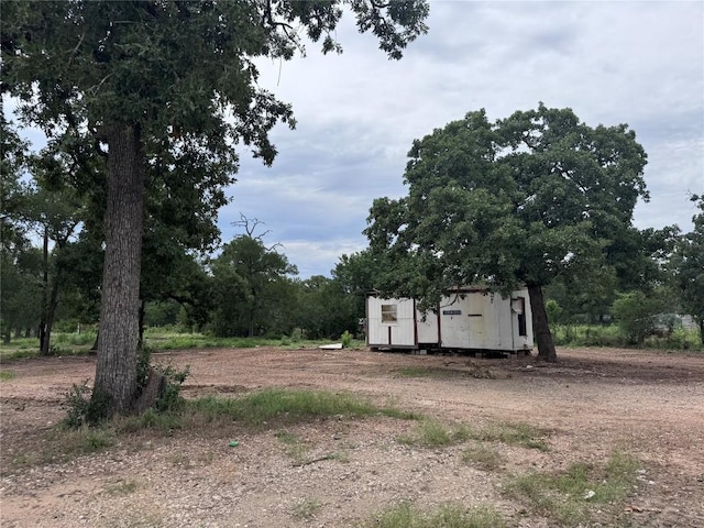 161 Fm 1209, Cedar Creek, TX 78612 - view of yard with a storage unit
