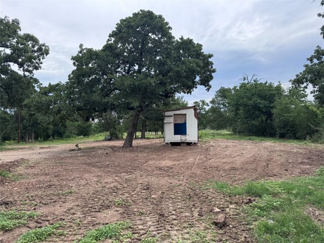 161 Fm 1209, Cedar Creek, TX 78612 - view of yard featuring an outdoor structure