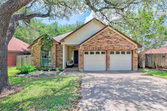 5907 Shanghai Pierce Rd, Austin, TX 78749 - single story home with brick siding, a garage, and driveway