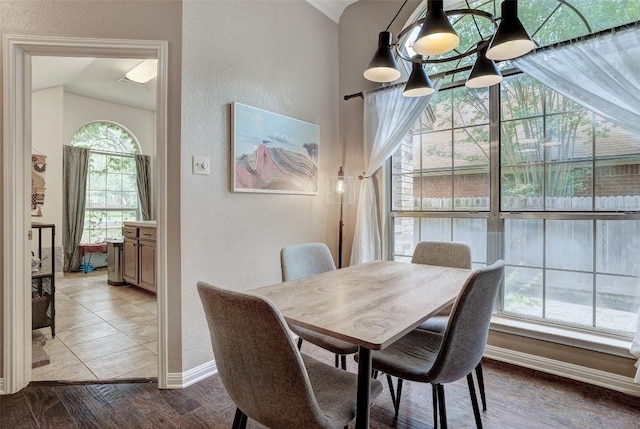 5907 Shanghai Pierce Rd, Austin, TX 78749 - dining space featuring a textured wall and wood finished floors
