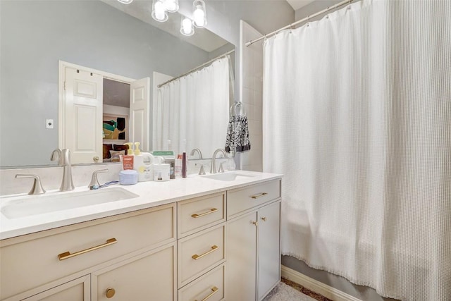 5907 Shanghai Pierce Rd, Austin, TX 78749 - bathroom featuring double vanity and shower / tub combo