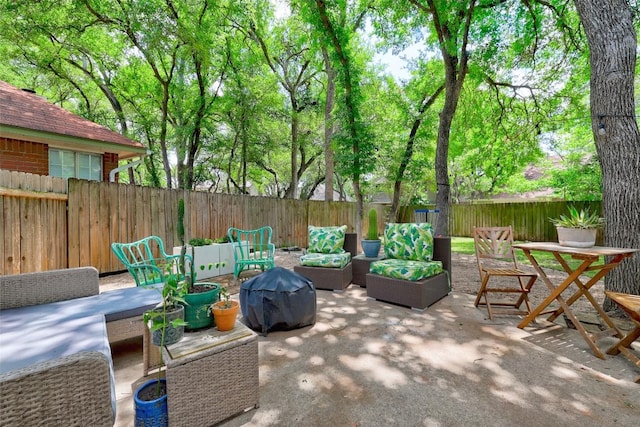 5907 Shanghai Pierce Rd, Austin, TX 78749 - fenced backyard featuring a patio and an outdoor living space