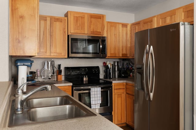 251 Barton Meadow Dr, Dripping Springs, TX 78620 - kitchen featuring stainless steel appliances and light countertops