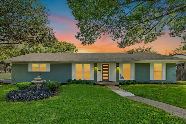 1806 Teton Dr, Austin, TX 78757 - view of front of home with a front lawn and brick siding