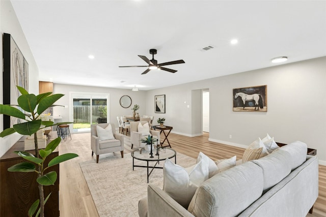 1806 Teton Dr, Austin, TX 78757 - living area with light wood finished floors, a ceiling fan, and recessed lighting