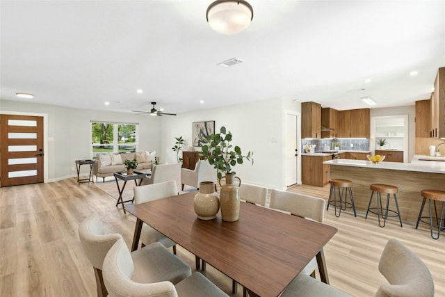 1806 Teton Dr, Austin, TX 78757 - dining area with light wood-style floors, recessed lighting, and a ceiling fan