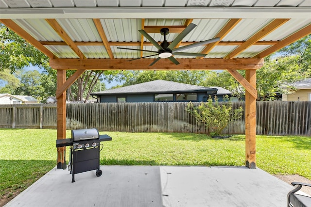 1806 Teton Dr, Austin, TX 78757 - fenced backyard with a ceiling fan, a patio area, and a grill