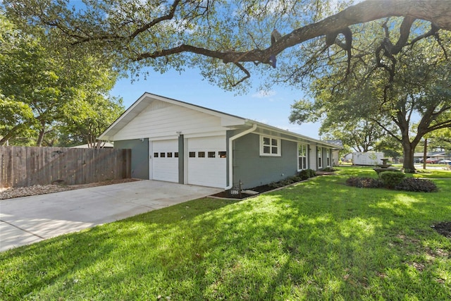 1806 Teton Dr, Austin, TX 78757 - view of side of property featuring driveway and an attached garage