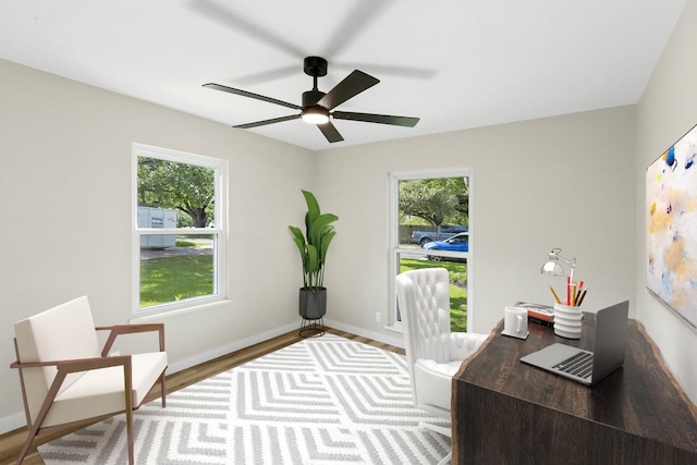 1806 Teton Dr, Austin, TX 78757 - office area with plenty of natural light, wood finished floors, and ceiling fan