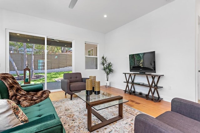 1719 Bunche Rd, Austin, TX 78721 - living area featuring wood finished floors, recessed lighting, and a ceiling fan