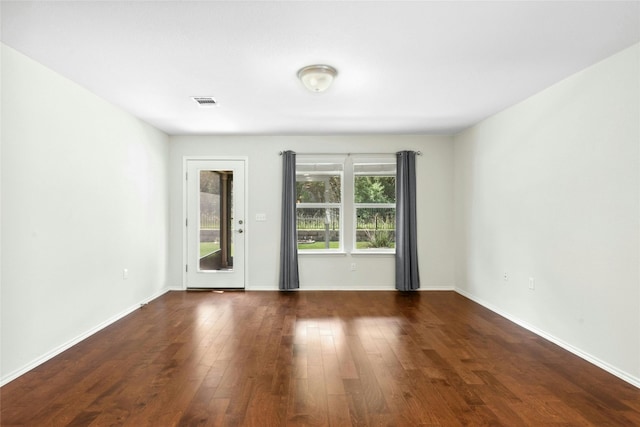 225 Hobby St, Georgetown, TX 78633 - spare room with wood finished floors and baseboards