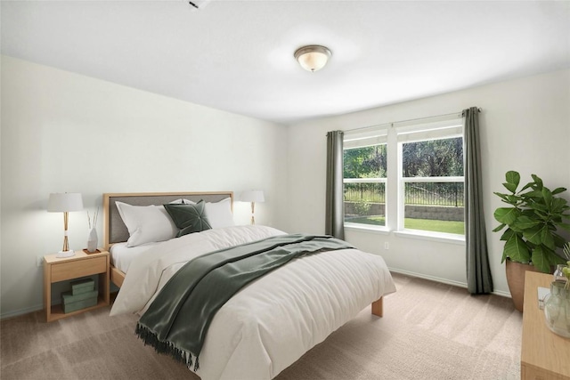 225 Hobby St, Georgetown, TX 78633 - bedroom with light carpet and baseboards